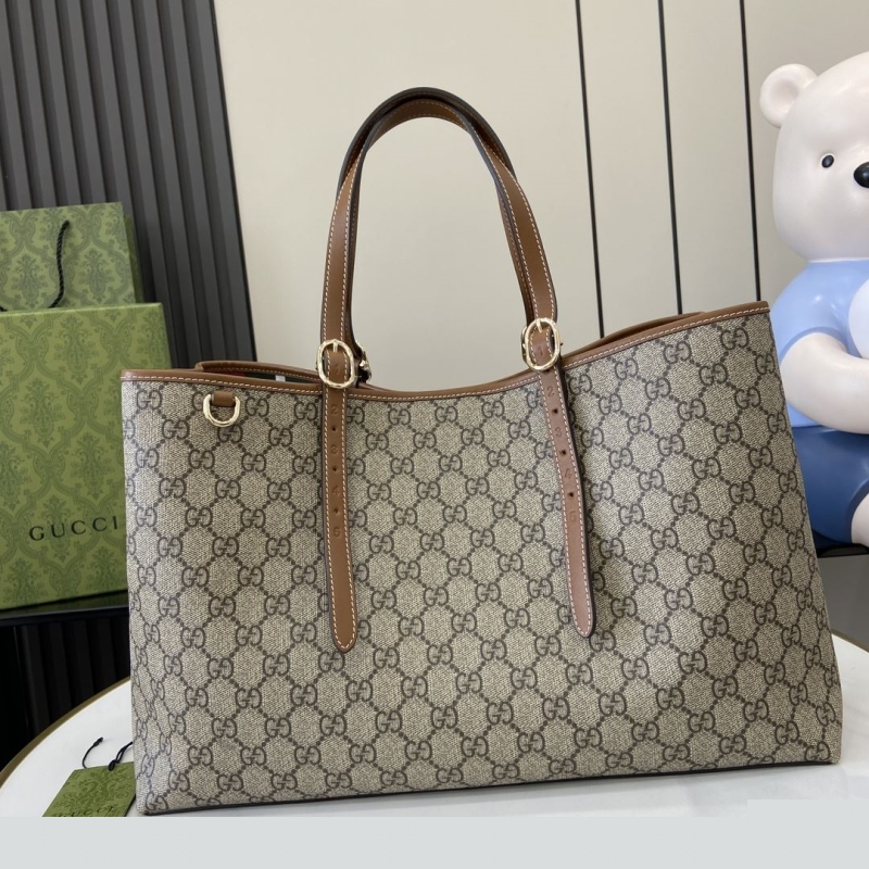 G*u*i shopping bags